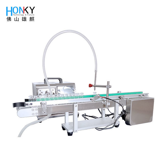 Machine de remplissage de flacons de type bureau Petite ligne de remplissage avec convoyeur d'alimentation en bouteille et Samll Bach Pour les soins de la peau Remplissage d'huile