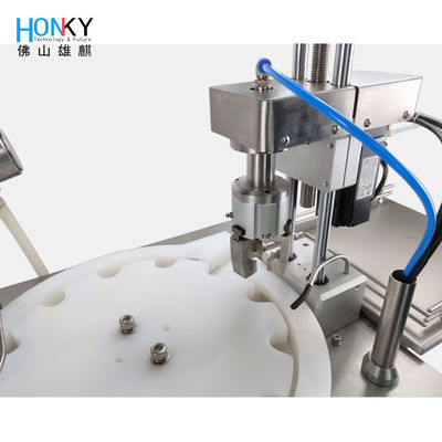 Appareil de remplissage automatique essentiel avec système de servo-moteur pour l'emballage de bouteilles en verre