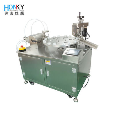 Machine de remplissage et de fermeture de bouteille en verre à 5 ml de bureau avec contrôle électrique complet pour le remplissage d'huile de soins de la peau